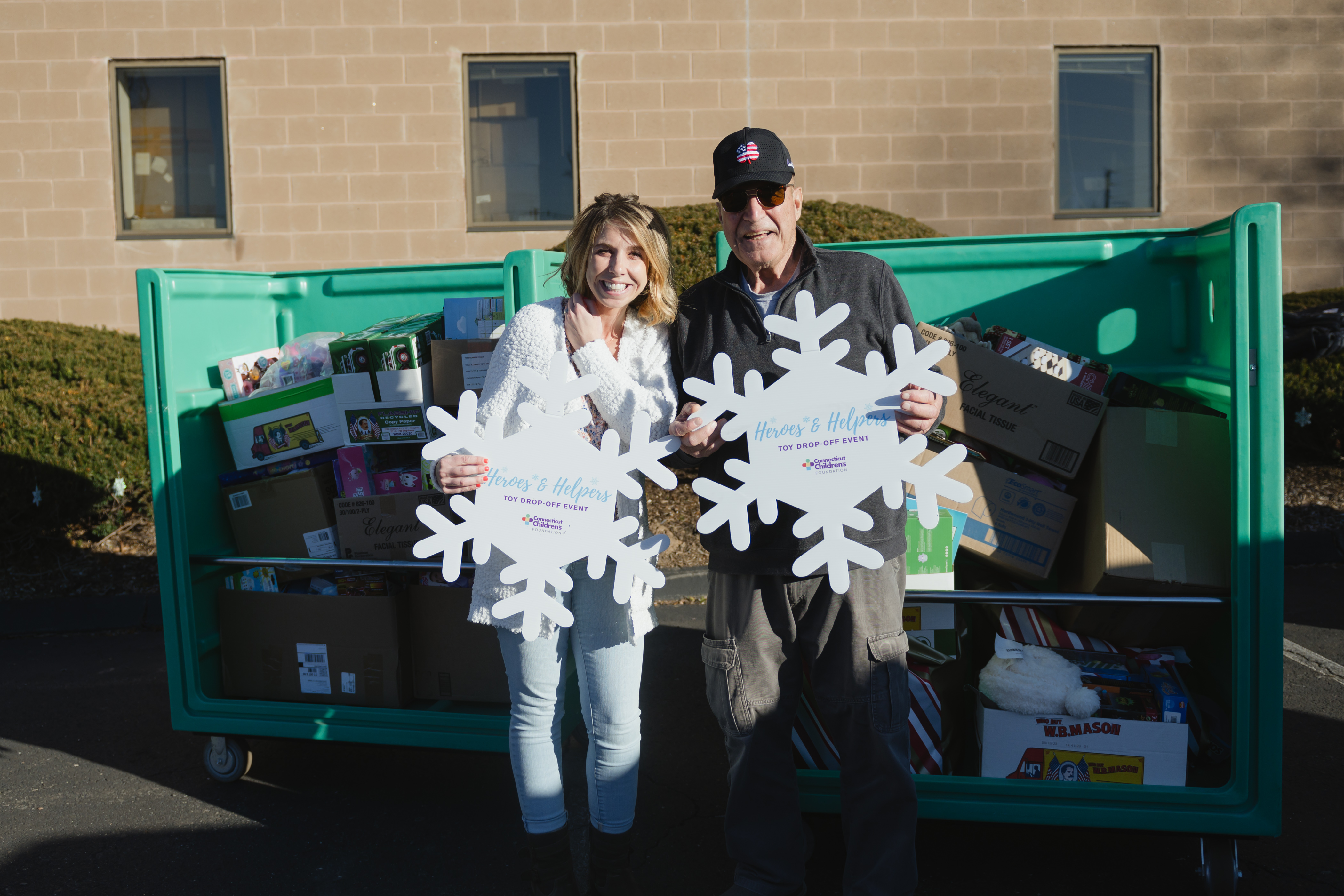 Supporters dropping off toys during our Toy Drop-off Event