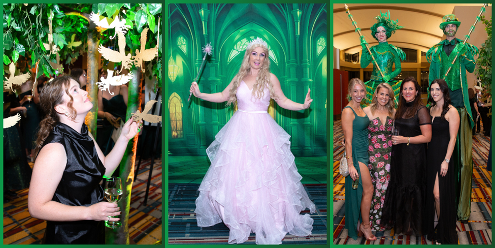 Guest picking a flying monkey off the tree, Glinda dressed up, and guests with the guards on stilts