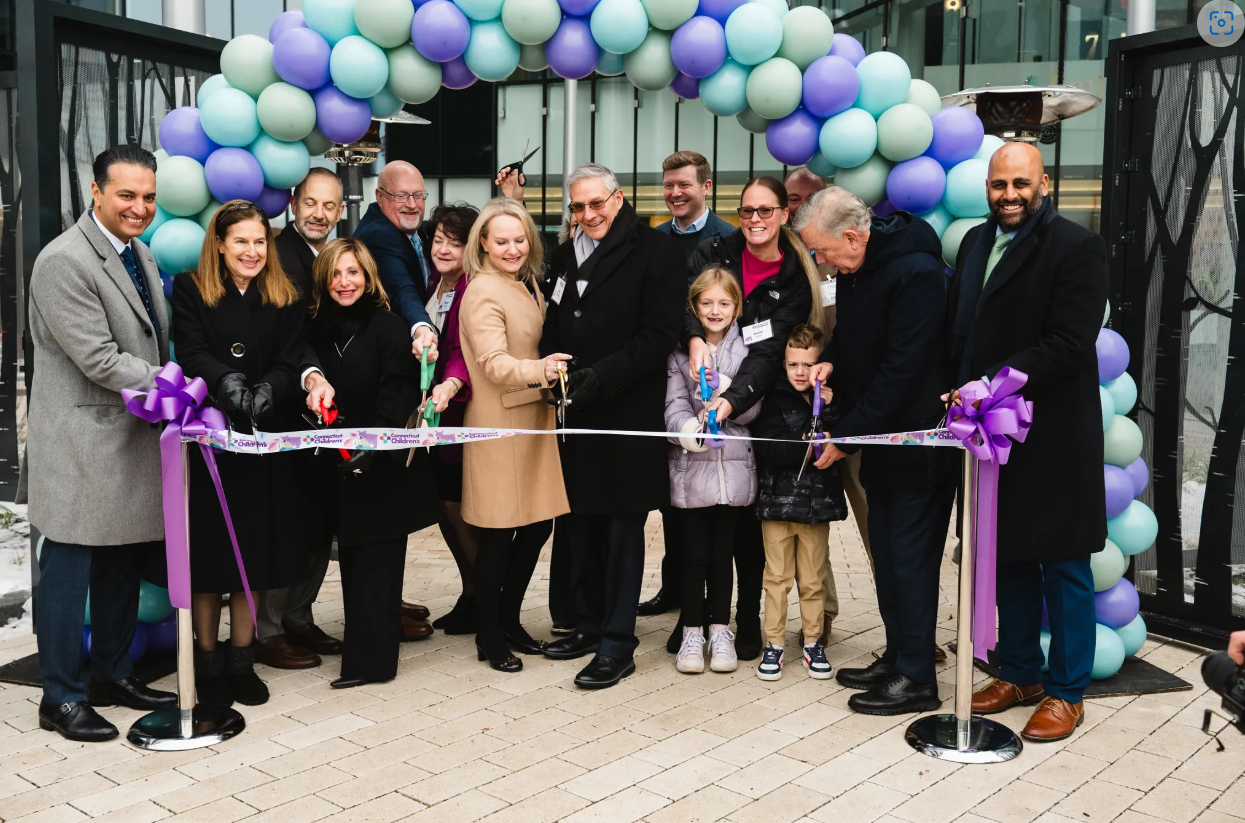 Team cuts the ribbon for the tower opening