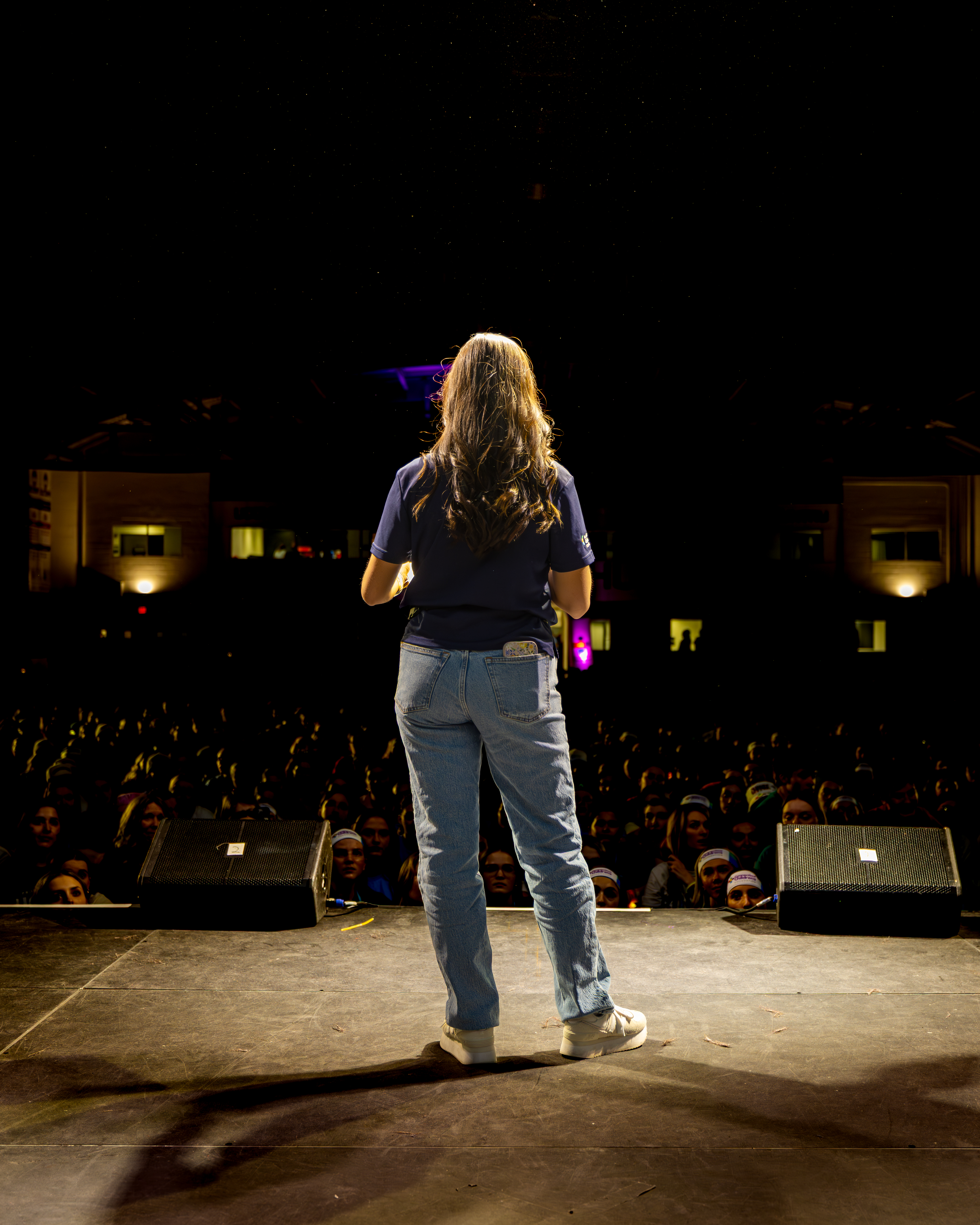  Alyssa Piccoli, student Executive Director stands on stage