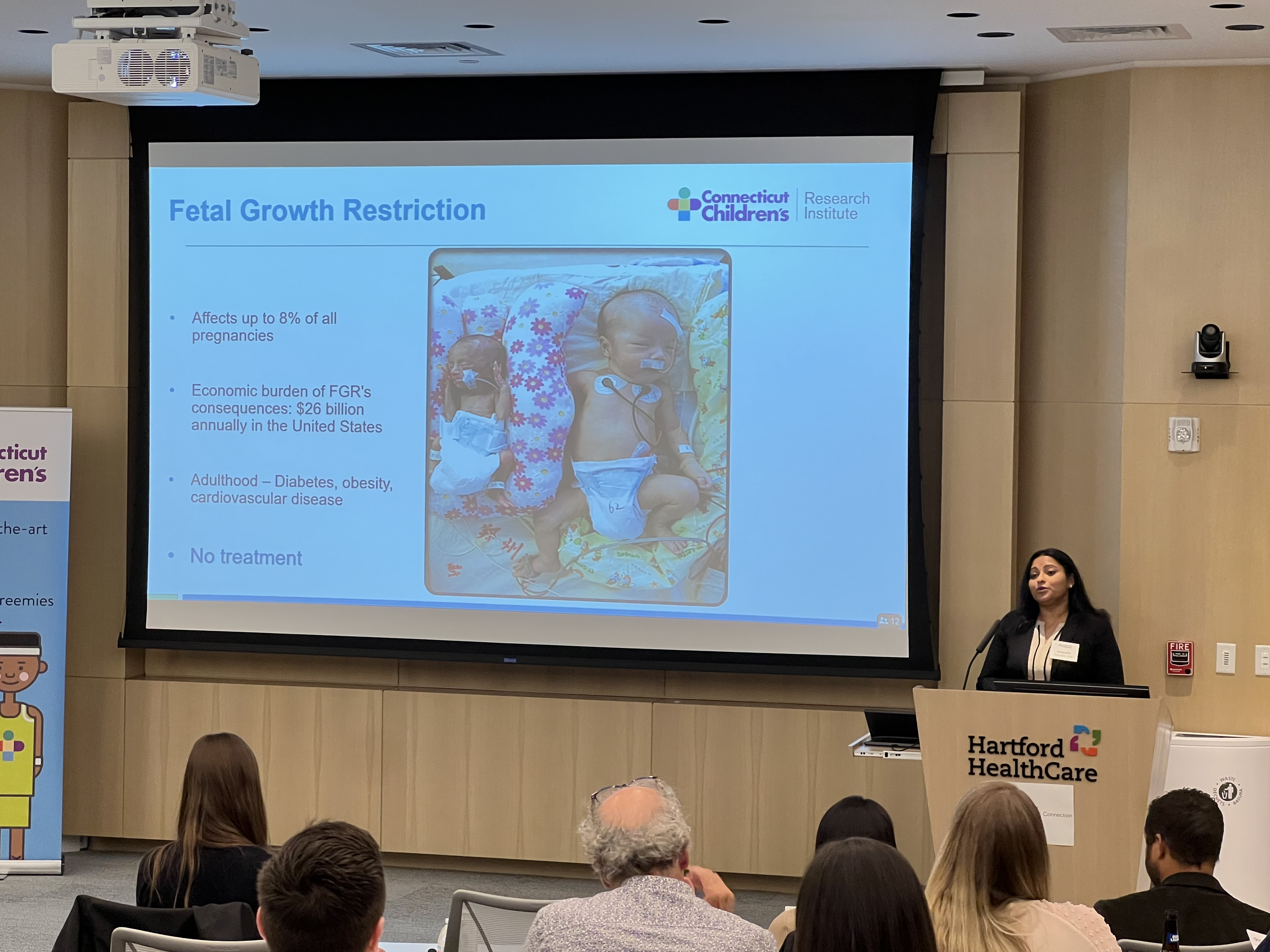 Dr. Majumder presenting research