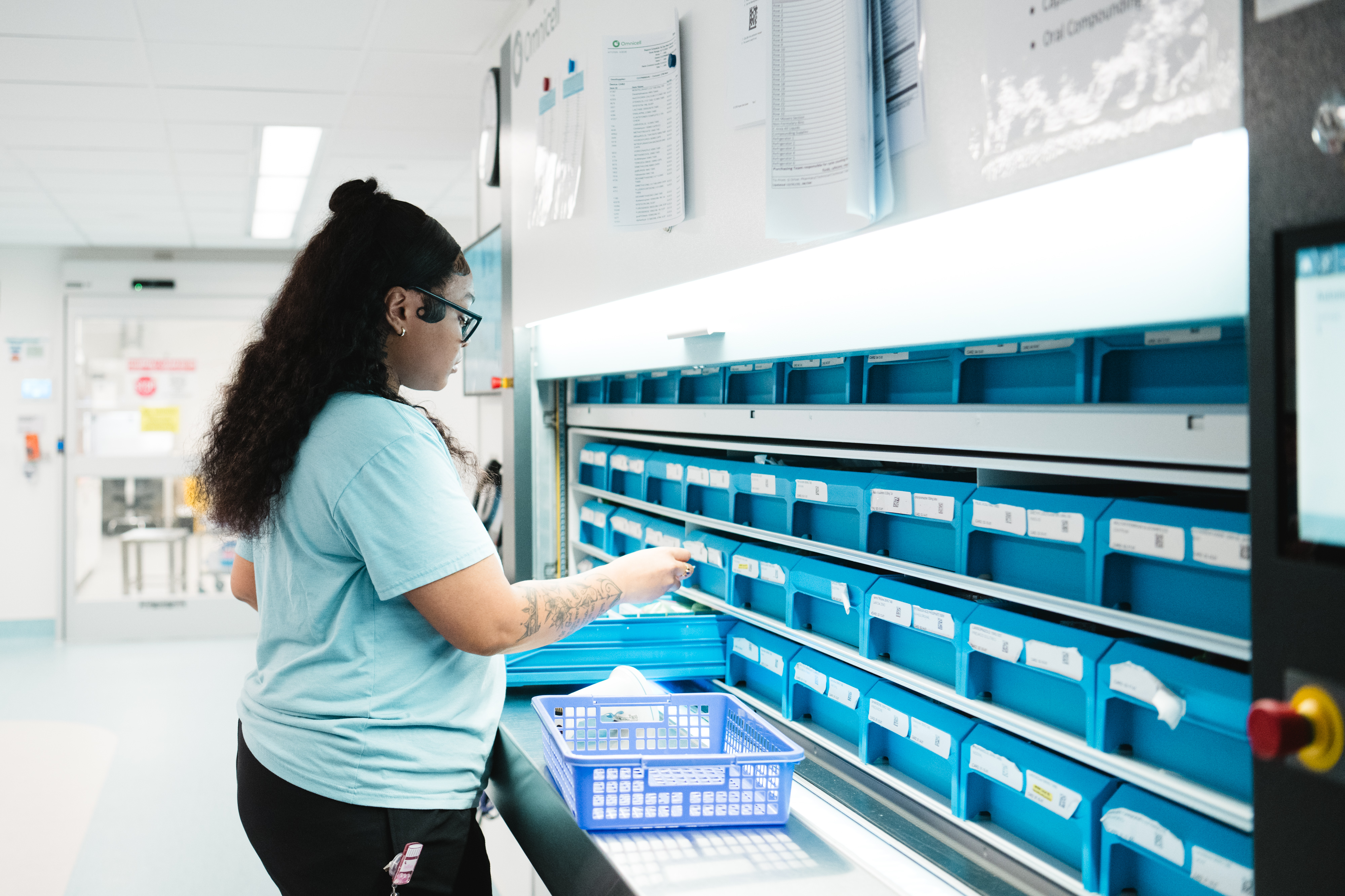 Pharmacy technician Jazmine Rose fills orders from the large Omnicell carousel
