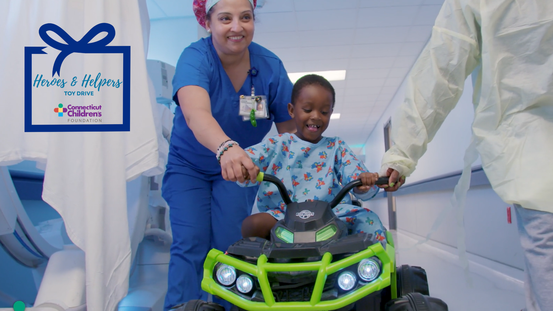 Child riding an electric car to his surgery