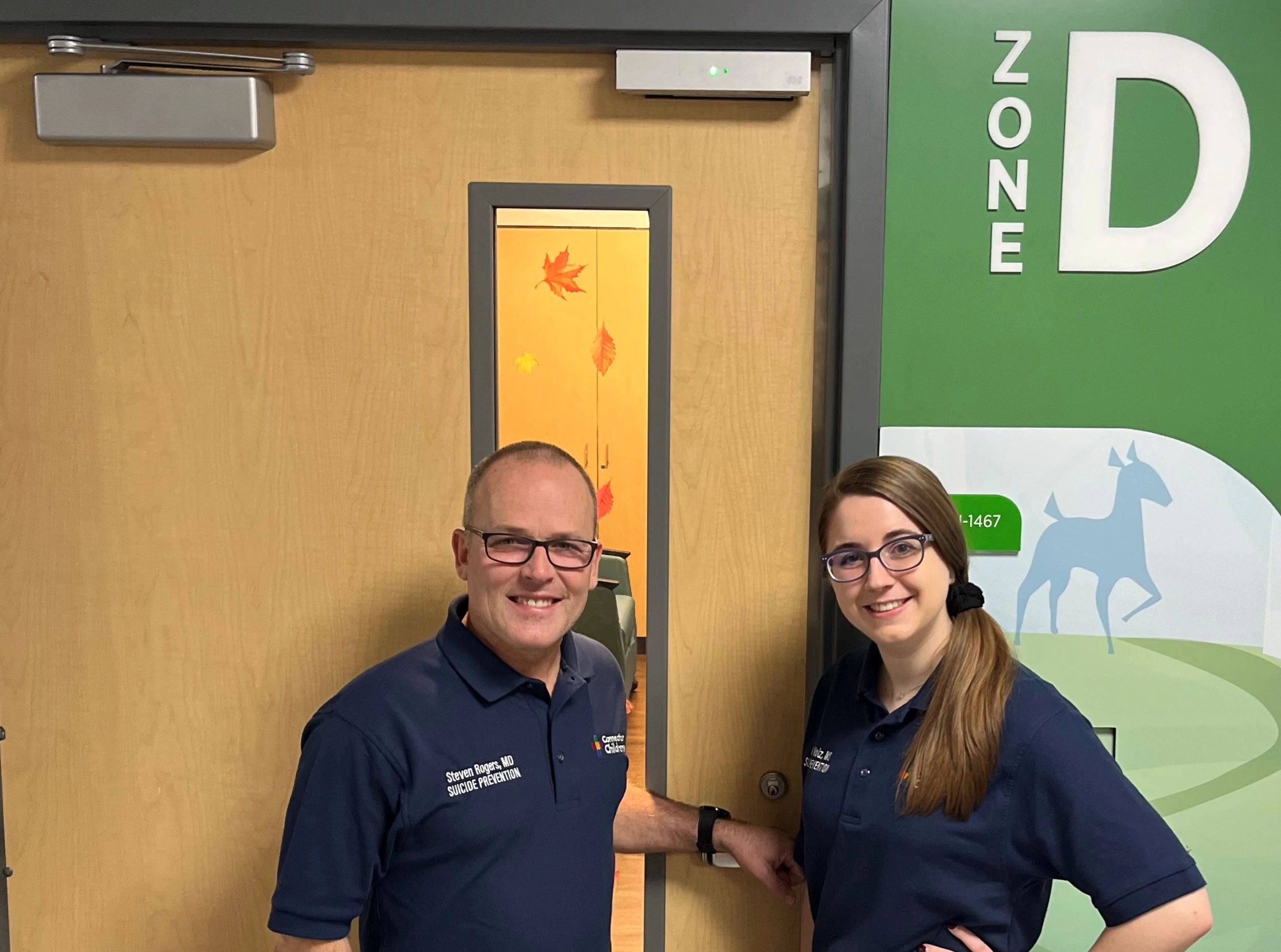 Clinicians standing outside of Zone D