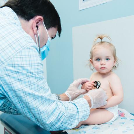 Patient is getting her vitals checked from our doctor