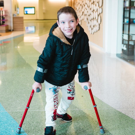 Patient walking through clinical Tower