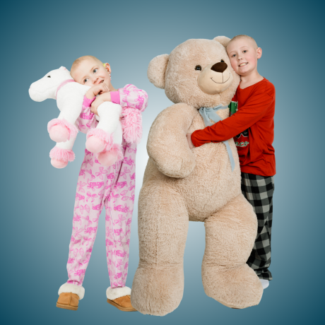 Carson and Anastasia holding stuffed animals
