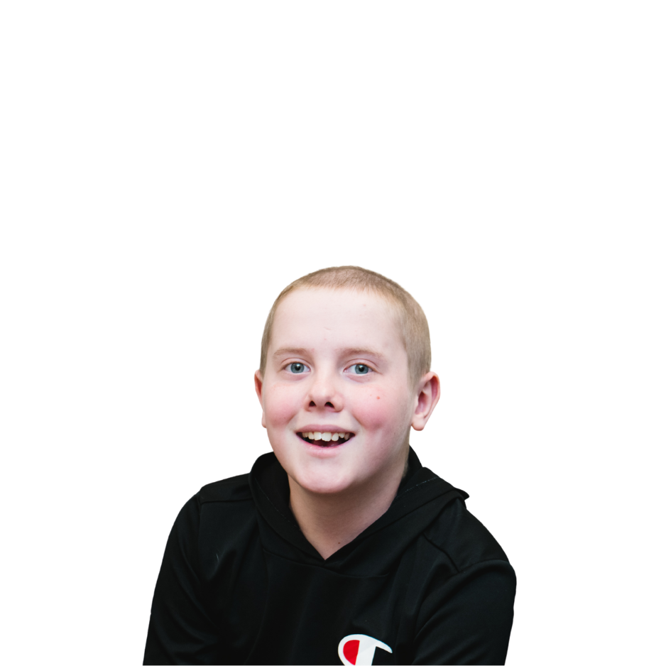 William smiling while playing video games