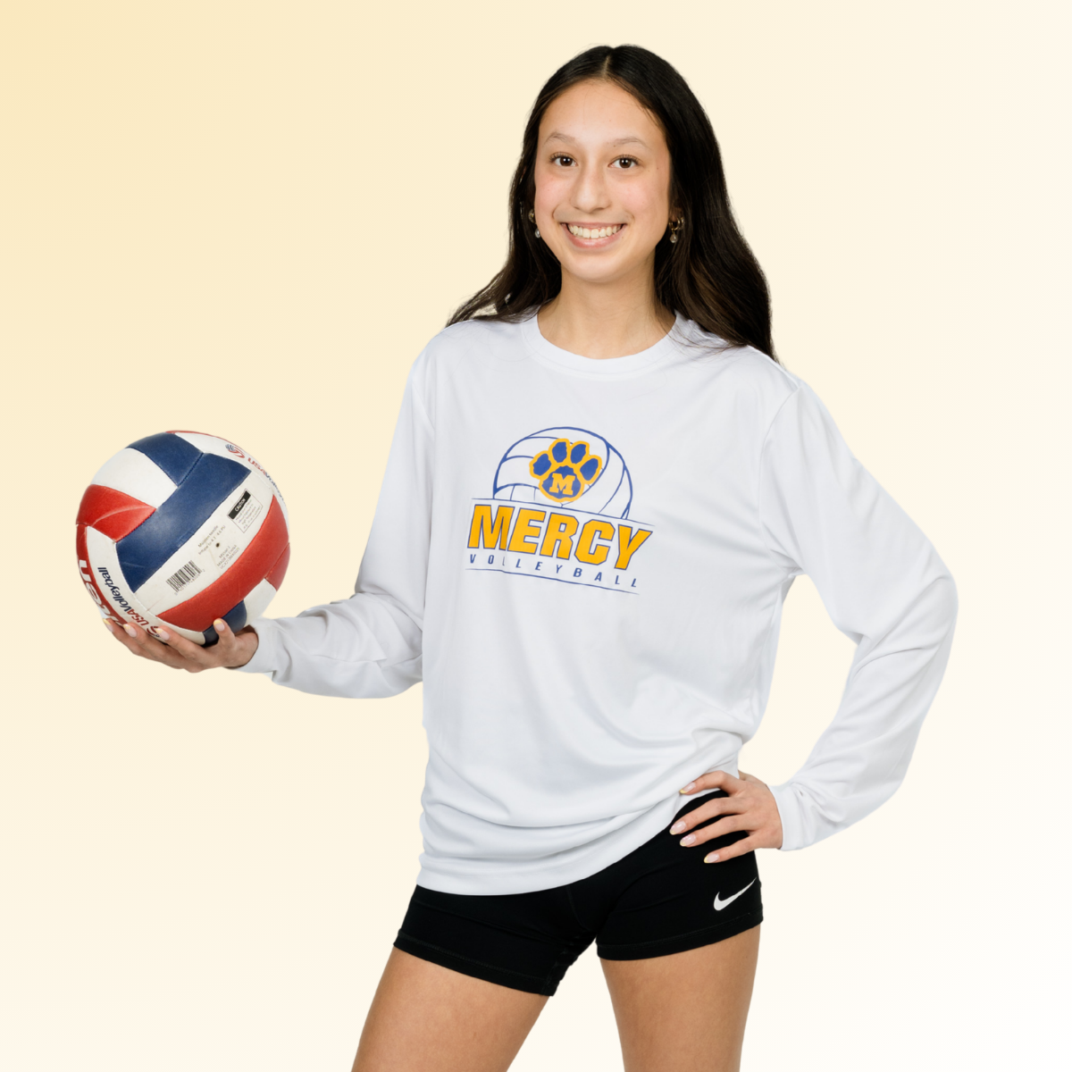 All Star Jordyn smiling holding a volleyball