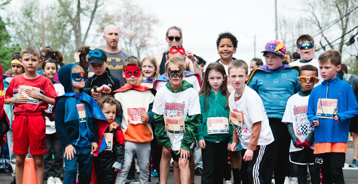 Superhero Sunday kids participating in their Superhero outfits
