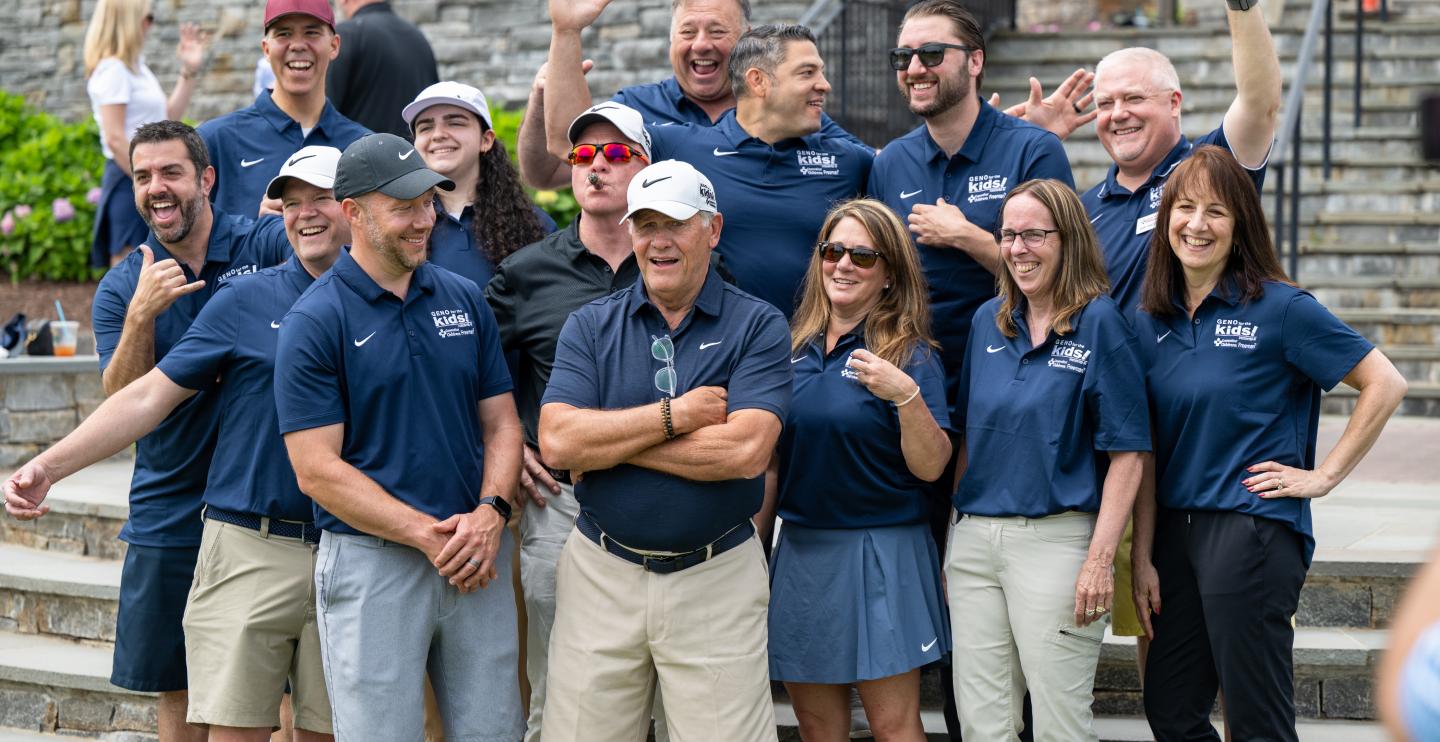 Geno Committee posing as a team