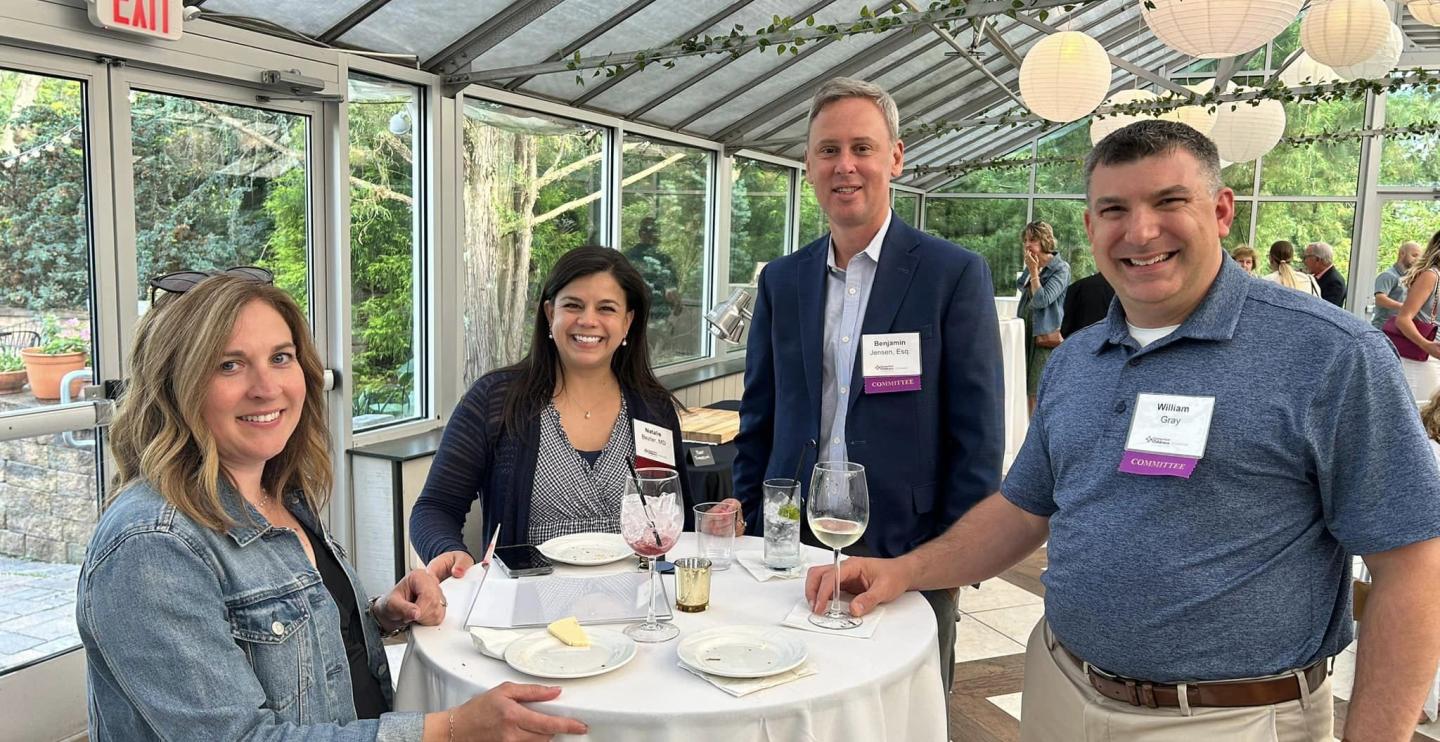 Connection members networking at an After Hours event