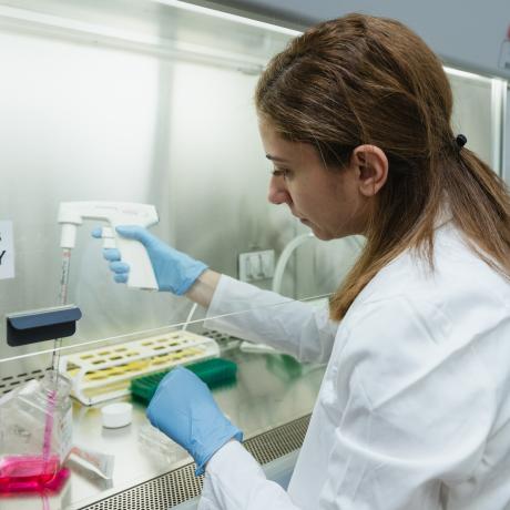 Dr. Saneh filling test tubes